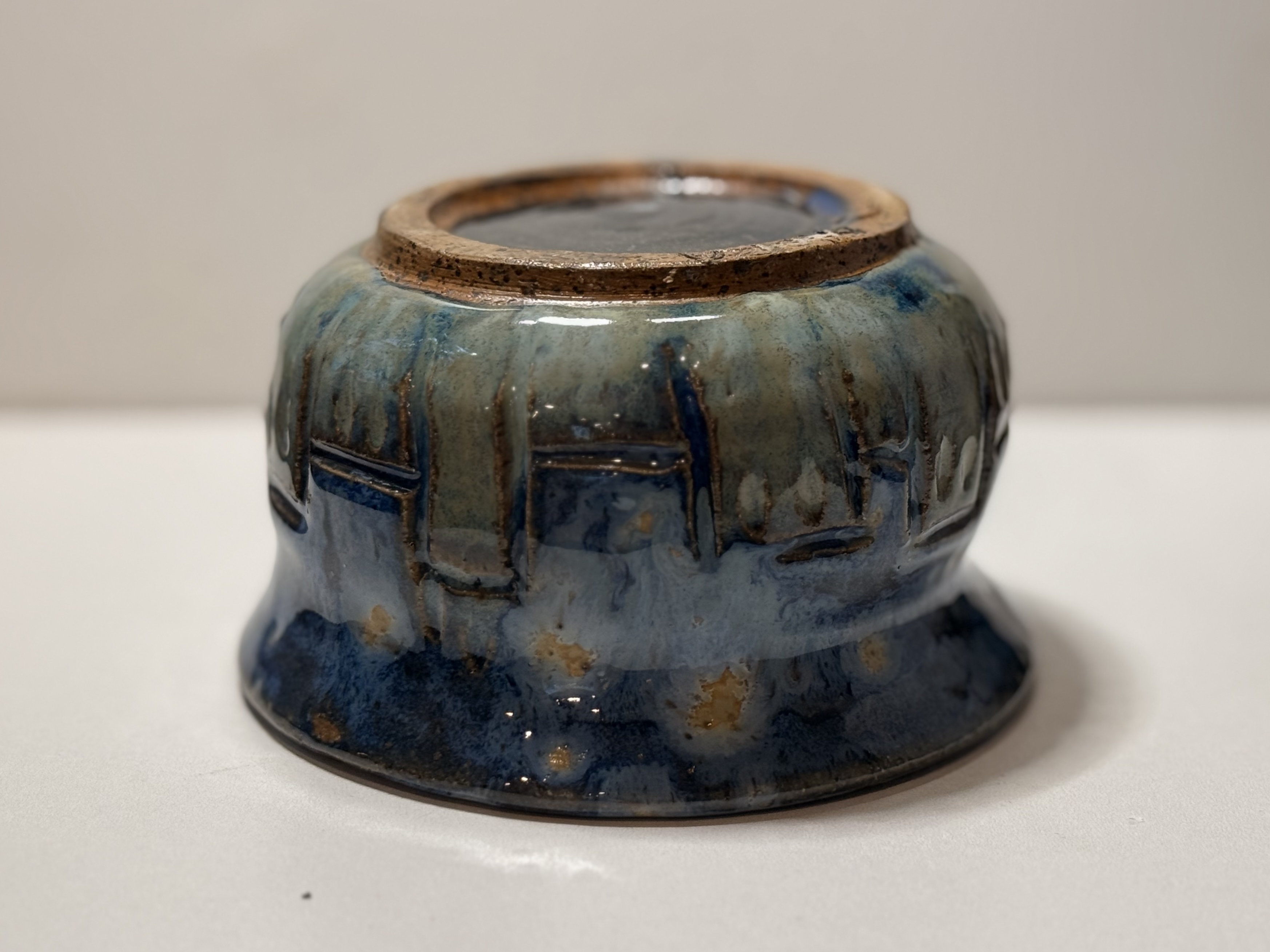 The foot and underside of a finished bowl.